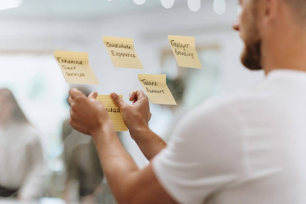 Sticky notes on a glass wall